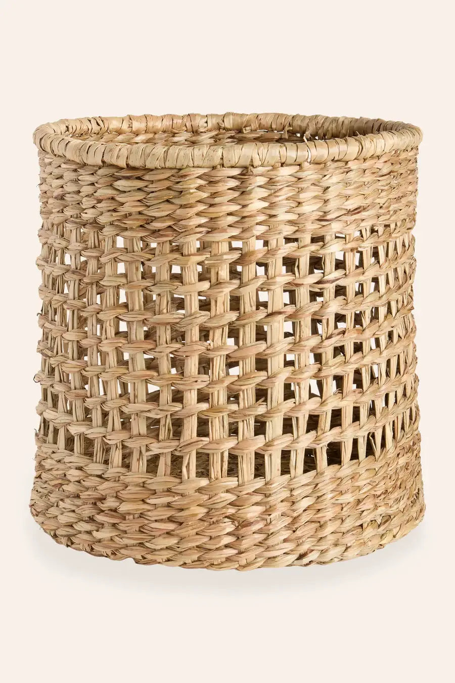 Runder Aufbewahrungskorb Lyon aus 100% geflochtenem Seegras im natürlichen Boho-Stil.