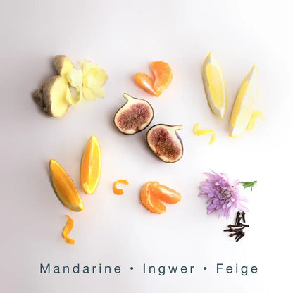 Nahaufnahme der Haupt-Duftkomponenten Mandarine, Ingwer, Feige, Nelken.