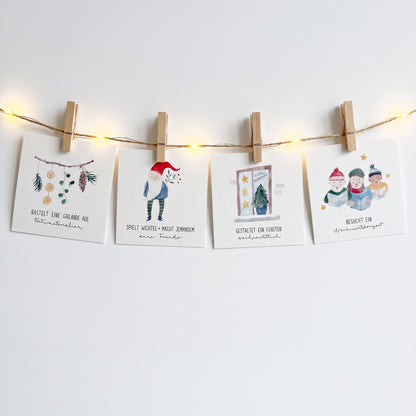 Adventskalender mit verschiedenen Aufgaben für die ganze Familie, hängt an einer beleuchteten Lichterkette und wurde mit hölzernen Wäscheklammern daran befestigt.