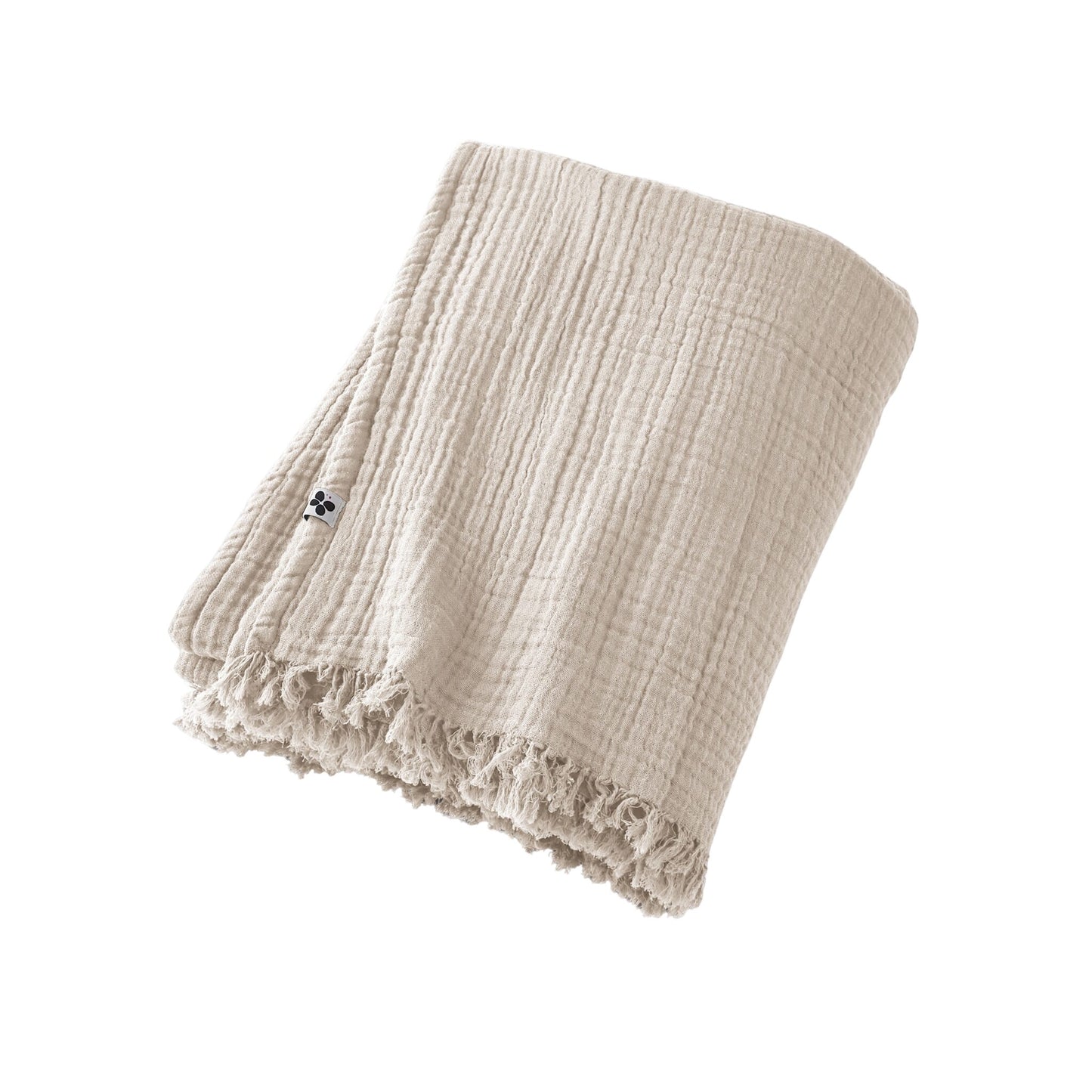 Kuschelige Musselin-Fransendecke Pampa aus vierfacher Baumwolle in Beige-Creme.