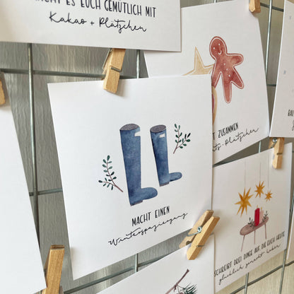 Der minimalistische Adventskalender für gemeinsame Momente liebevoll mit Wäscheklammern aufgehängt.